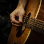 Strings Attached: A Comprehensive Guide on How to String a Guitar